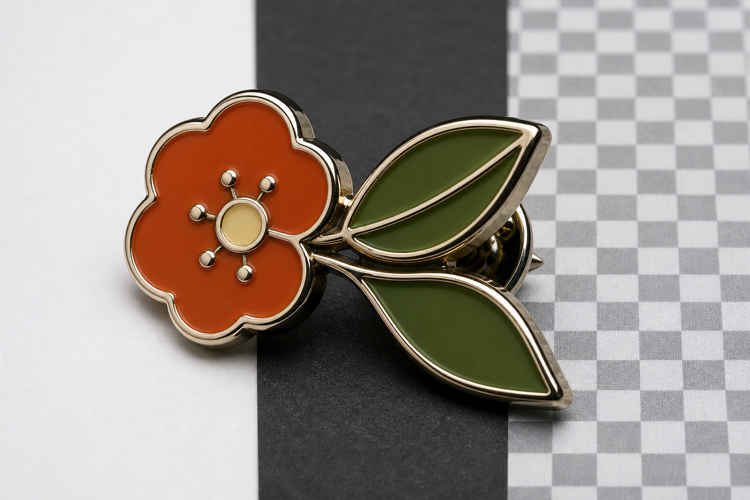 Macro comparison of reflective enamel pin edges against light and dark surfaces
